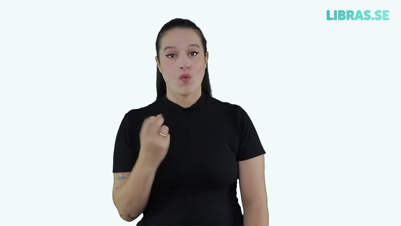 Intérprete fazendo o sinal de Suco em Libras